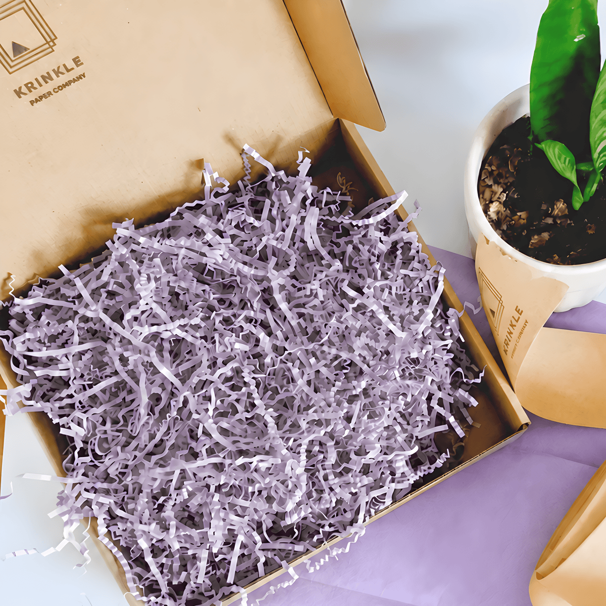 Heather crinkle paper styled in gift packaging